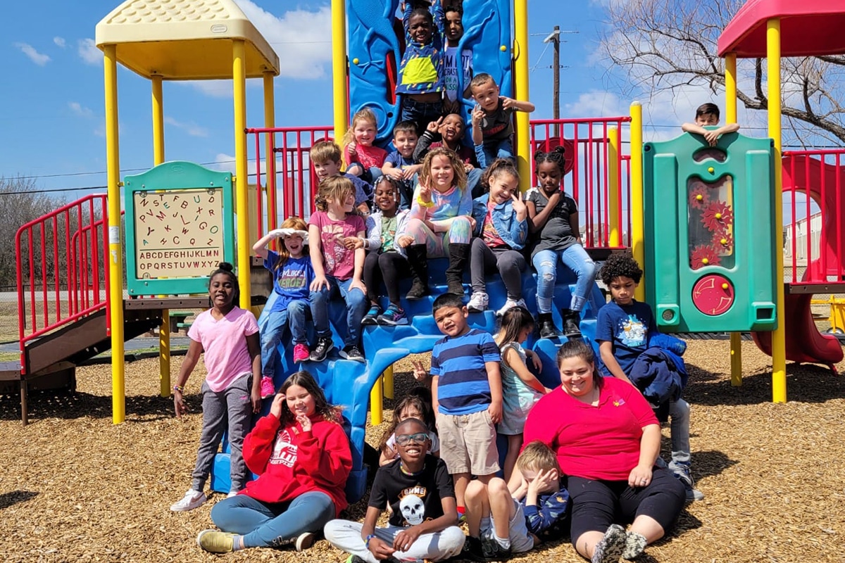 Spacious Playgrounds, Basketball, & A Garden Keep Them Moving